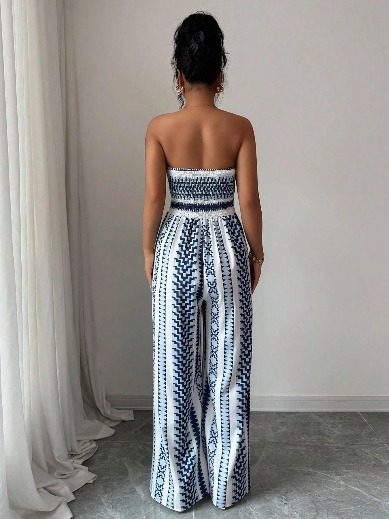 👗 50 % RABAT NU! 🌺 Geometrisk jumpsuit med sideslids – elastisk ryg & unikt mønster ✨