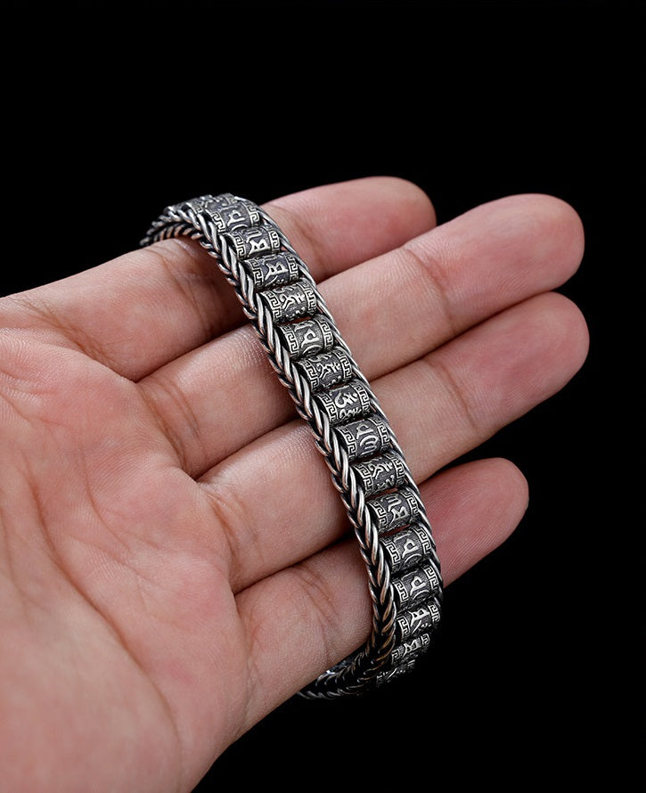 Seks tegn sandhed-bønnehjul armbånd