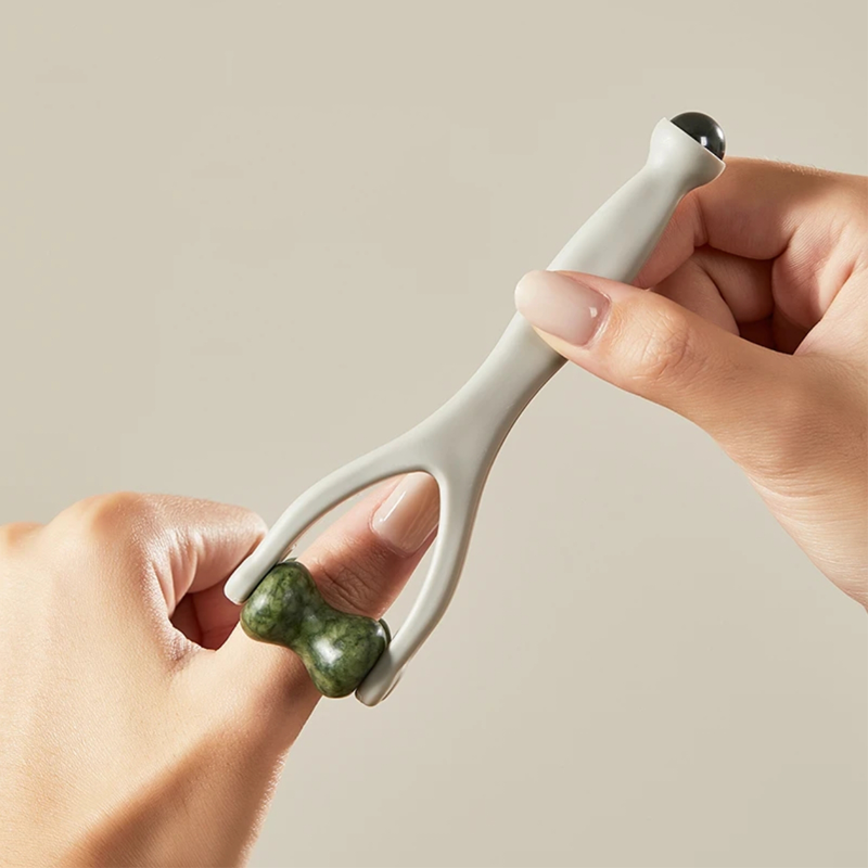 Massage­set i Naturlig Sten: Skrapbräda, Fingerklämma & Ægformet Massageappara