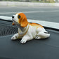 🎉 2026-udsalg — over 12.000 solgt! 🐶 Sød hundebobblehead – nikker med i hvert sving – 10 racer, blød plys, guldkæde – bringer smil på hver køretur 🚗